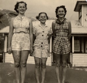 Margaret Browne on the left, outside Piha surfclub, 1941