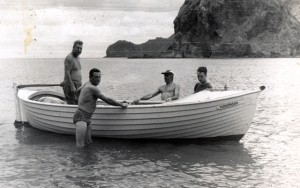 Warwick as a boy with the Harmony. His father Alf is standing in the boat